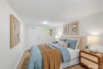 Lower bedroom is adjacent exterior relaxation space.