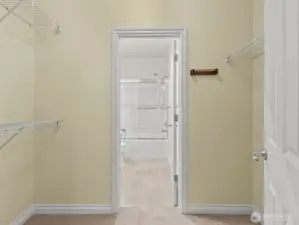 The walk-through closet is a great size for your wardrobe.