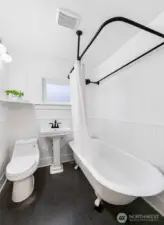 Full bathroom with clawfoot tub