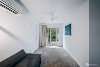 This wing of the primary bedroom features a slider to the private rear yard. Dog ready with doggie door that leads to a fully fenced dog run