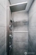 The shower offers a waterfall head, rain, jet, and hand-wand options with LED readout of time and temperature