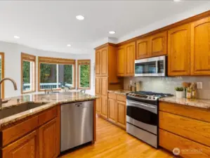 QUALITY CABINETS AND WOOD DETAIL THROUGHOUT