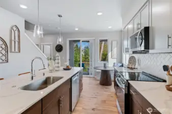 Photos are of community model home. Color packages and upgrades will vary from home to home.