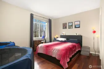 The primary suite offers ample space for larger furniture...