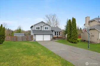 Unlike many Marysville homes with short, sloped driveways, this property offers a level, long driveway with parking for 8-10 vehicles off-street (or your trailer/RV).