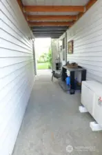 Covered breezeway. Notice the Mitsubishi heat pump.