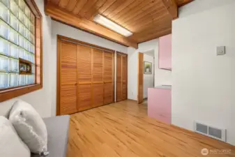 Huge utility room with multiple closets. has doubled as a workout room.