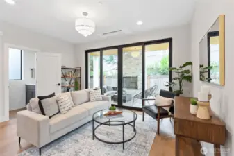 Cozy indoor-outdoor flow with a fireplace, perfect for relaxing or entertaining year-round.
