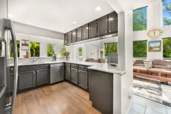 Kitchen opens to dining and living rooms