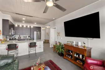 Spacious living room flows out onto the beautiful patio and into the kitchen. Fully tiled throughout the living room, kitchen and entryway. Just some of the amenities this unit has waiting for you.