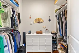 Walk-in closet with the Primary Suite.