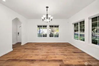 The dining room is spacious w/ plenty of room for large gatherings and great natural lighting and view from the windows.