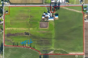 Photo of well location along the Southern border of propety, Their are 2 seperate, 5 inch, Mainlines running North and South across the property