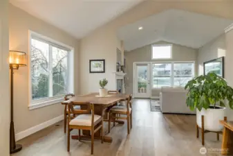 Sophisticated main-level living space highlighted by vaulted ceilings and stunning engineered hardwood floors