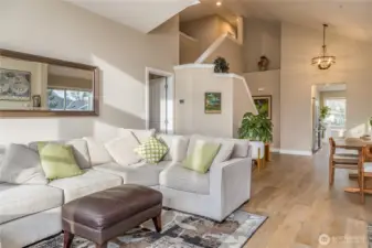 Main-level living at its finest, featuring a bright, open floor plan and a well-positioned entrance to the primary suite