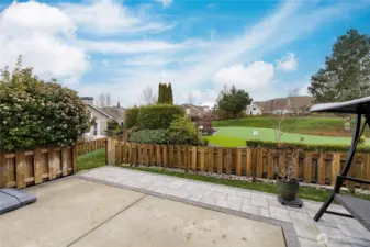 Exceptional location! This end-unit offers a prime vantage point of the community putting green from the comfort of your private, fully-fenced backyard.
