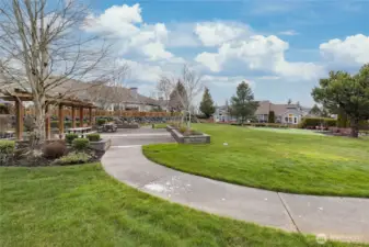 Quiet community greenspace featuring a picnic area and well-manicured grounds, managed entirely by the HOA