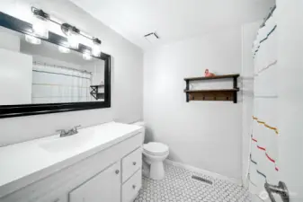 Shared bath is updated with newer vanity, flooring, lighting and more!