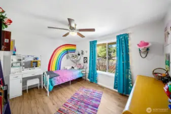 Bedroom #3 with some character! Nice ceiling fan and large sunny window