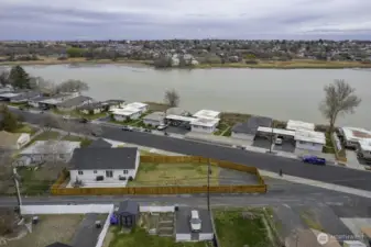 Notice how close to the lake the home is sitting. There are some views from the front of the home as well.