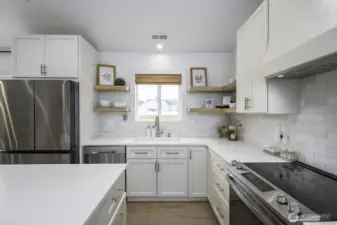 This kitchen is a dream with plenty of cupboards and counter space