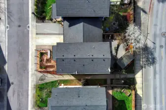 Aerial view of townhouse. A walkway beside property to Guard Street.