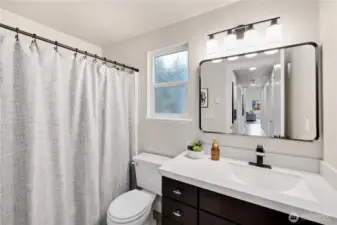 2nd Bath, with new lighting, mirror, and faucet