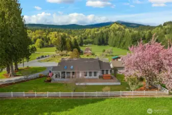 Home looking North. Home is nearly fully fenced with large deck to enjoy views in every season.