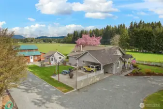 View looking south east with circular driveway entrance.
