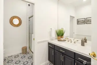 Updated three-quarter bath on the main floor.