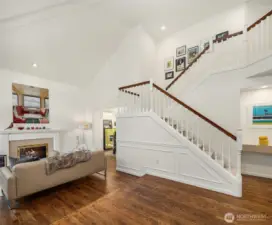 Stunning hardwood floors and vaulted ceilings greet you upon entry, setting the tone for the style of the rest of the house.