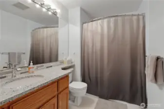 Upstairs hall bathroom conveniently serves all bedrooms, offering practical and accessible amenities