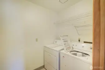 Main laundry with entry to garage