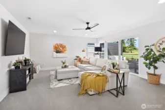 Massive bonus room upstairs perfect for movie nights.
