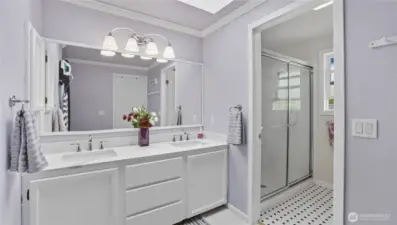 Enjoy a 3/4 bath en suite featuring a double vanity-offering both space and comfort in your private retreat.