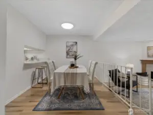 Beautiful vinyl plank flooring runs throughout the home. The kitchen includes a breakfast bar.