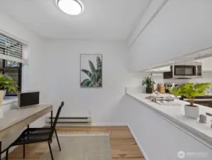 This space is also open to the kitchen and could be additional eating space if desired.