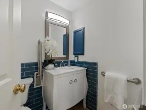 The bright and cheerful primary full bath.