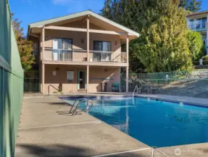 The clubhouse balcony overlooks the outdoor pool.