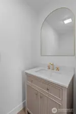 1/2 bath off the kitchen/living room.