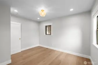 Sitting room or office off entry.  Left door goes downstairs.