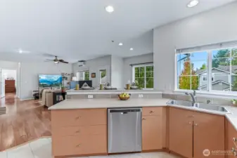 The wall of windows in this top-floor end unit, brings in abundant natural light, creating a bright and welcoming atmosphere you will adore!