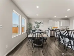 Dining room.  Finishes and options may vary.