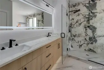 Double vanity with back lit mirror (photo of similar home in separate community)