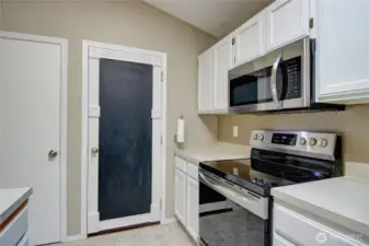 The garage out to the garage is on the right and the deep pantry is on the left.