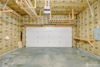 Insulated garage with upper storage.
