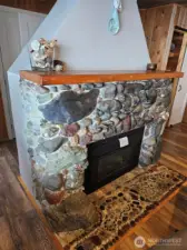Cool, Cozy Rock faced Fireplace