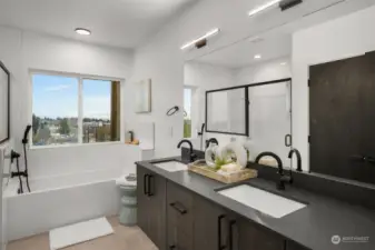This primary bathroom is as luxurious as it gets with a 5-piece bathroom including a walk-in shower, stand alone tub, dual vanity sink, and linen closet