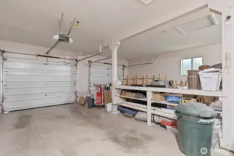 Oversized 2 car insulated garage is a dream. Insulated, with 50 amps for kiln or welder
