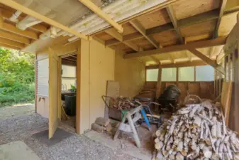 Perfect garden shed with electricity and benches, wood storage